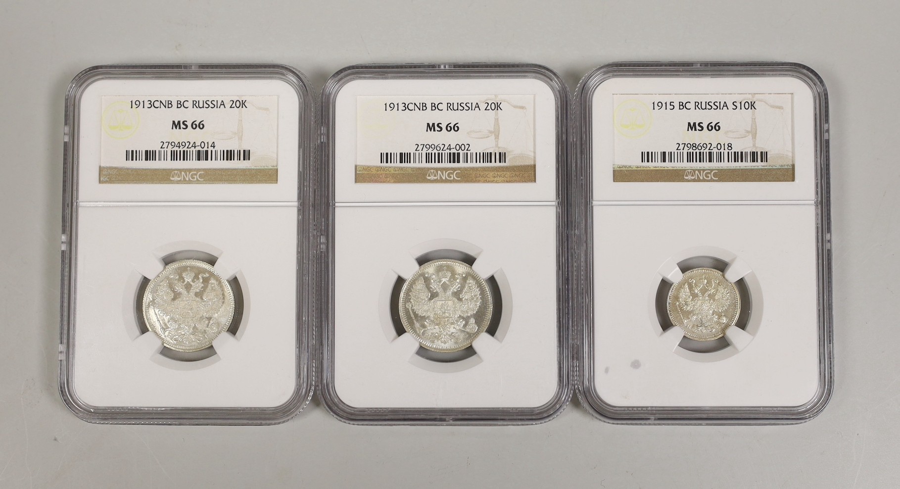 Russia coins, two 20 kopeks 1913CNB and 10 kopeks 1915BC, all NGC slabbed and graded MS66 (3)